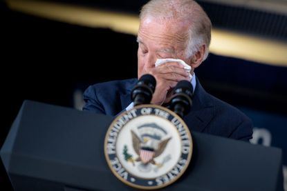 US Vice President Joe Biden cries while speaking about the death of his son and the support he received from Amtrak employees at Amtrak's Joseph R. Biden, Jr., Railroad Station onAugust 26, 2016 in Wilmington, Delaware