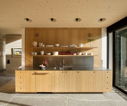 modern kitchen with stone floor
