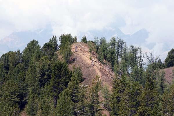 Riders descend a ridge during the TransRockies stage 1.