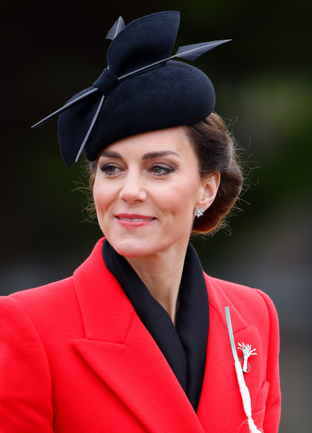 Catherine, Princess of Wales (wearing the traditional St David's Day leek and her diamond leek brooch) attends the St David's Day Parade during a visit to the 1st Battalion Welsh Guards at Combermere Barracks on March 1, 2023 in Windsor, England