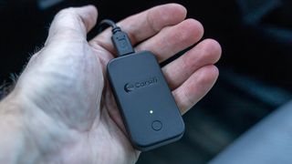Carsifi Android Auto adapter in hand.