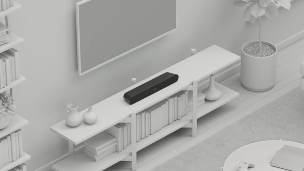 Sonos Ray on a TV stand surrounded by white furniture