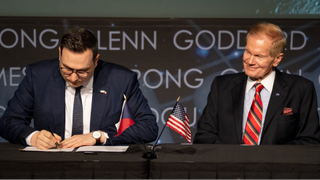 Foreign Affairs Minister for the Czech Republic, Jan Lipavský, left, signs the Artemis Accords, as NASA Administrator Bill Nelson looks on, Wednesday, May 3, 2023, at The Mary W. Jackson NASA Headquarters building in Washington DC. 