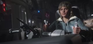 a young woman at the controls of a spaceship in the upcoming video game 'star wars outlaws'