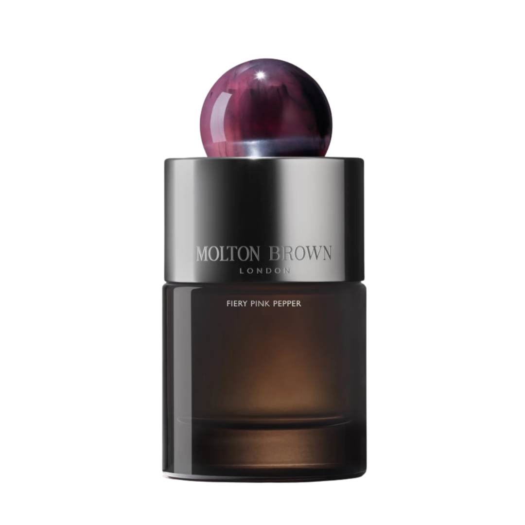 A product shot of the Molton Brown Fiery Pink Pepper perfume, on a white background