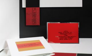 Fashion week invitations featuring three red prints.