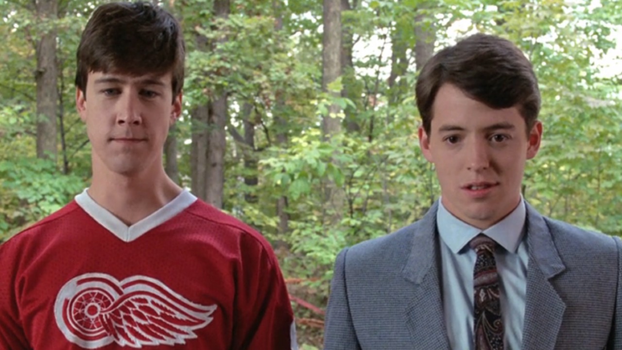 From left to right: Alan Ruck as Cameron and Matthew Broderick as Ferris standing next to each other in Ferris Bueller's Day Off. 