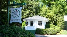 Augusta National entrance and member's only sign