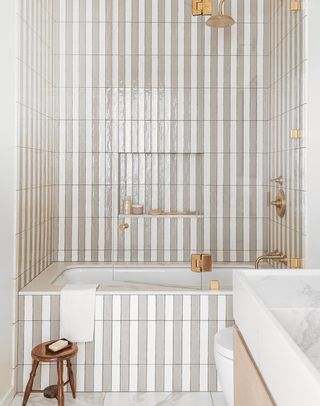 minimalist bathroom with grey and white striped tiles