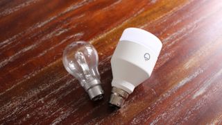 On the left a full-sized traditional bulb, on the right Lifx