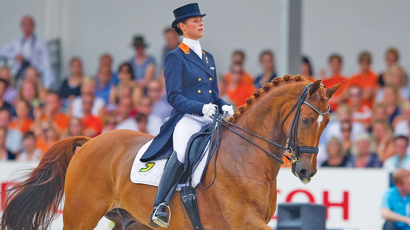 DAPH8K Dutch dressage rider Adelinde Cornelissen rides her horse Jerich Parzival during the Grand Prix Special at the European Dressage Championship in Rotterdam, Netherlands, 21 August 2011. Cornelissen won first place. Photo: Uwe Anspach
