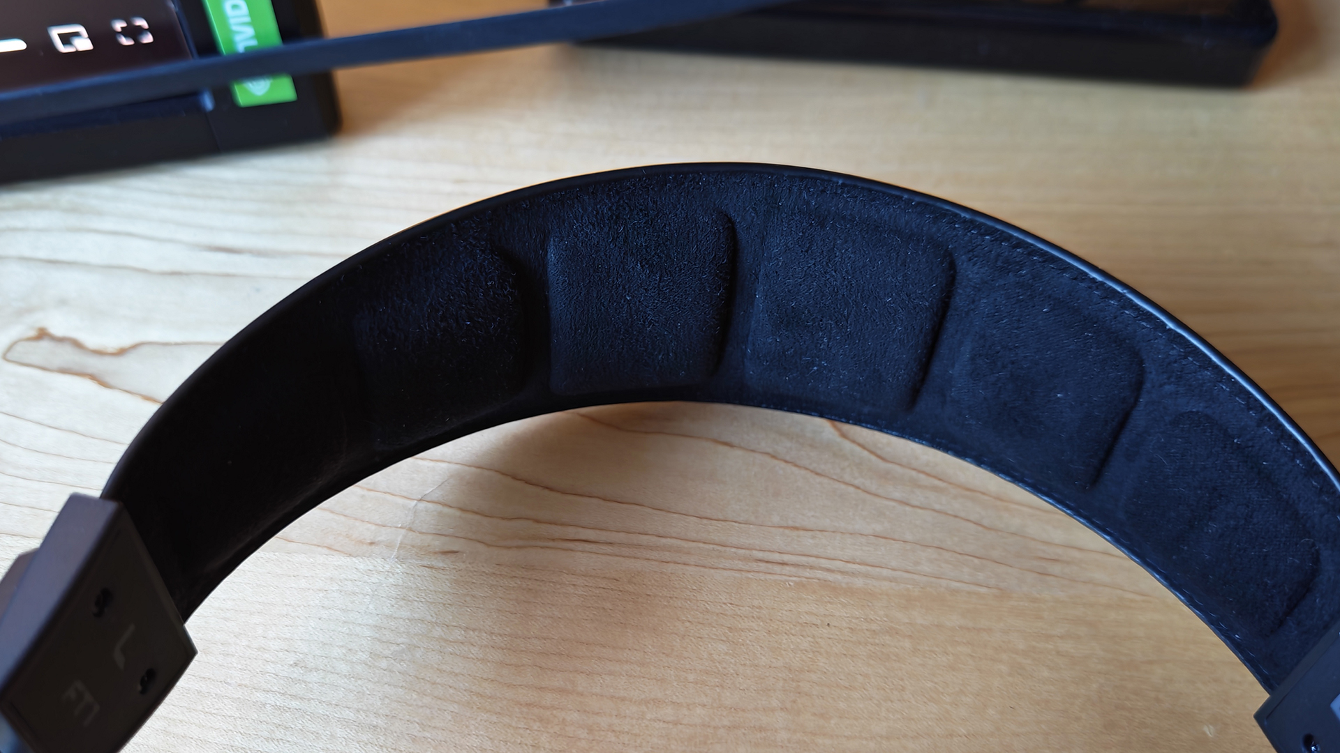 Various photos of the FiiO FT1 headphones, in a home office. 