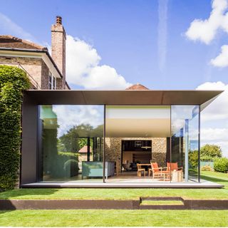 modern glass extension with flat roof