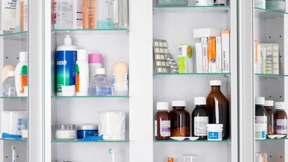 medicine cabinet with medication and toiletries