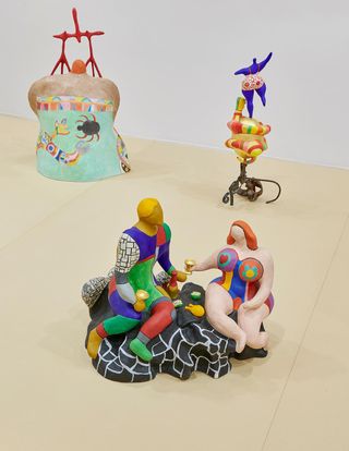Niki de Saint Phalle Nanas sculptures in MoMA PS1 exhibit .