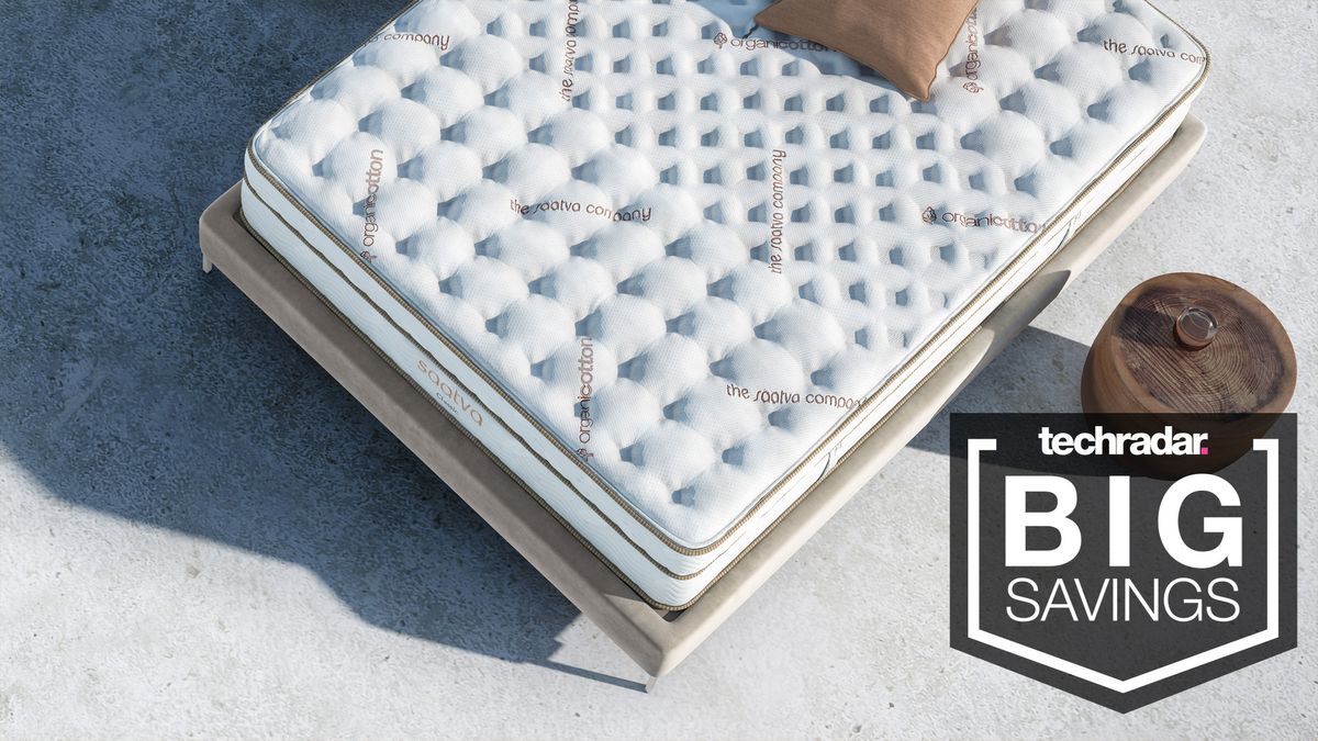 A Saatva Classic mattress seen from above, with a badge saying &quot;BIG SAVINGS&quot;