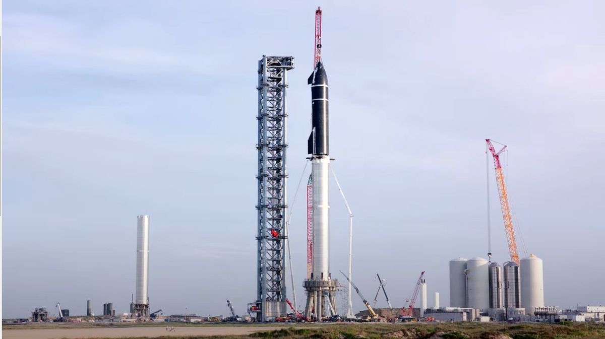 SpaceX&#039;s Starship is stacked atop its Super Heavy for the first time in August 2021 during tests of the new, giant reusable rocket.