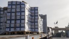 Trucks carrying aid enter Gaza through the Rafah border crossing