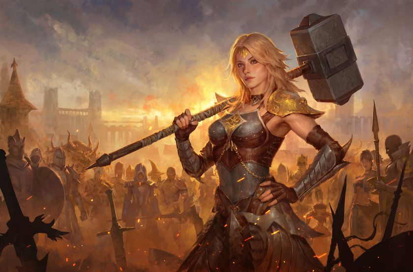A woman in armour wielding a huge warhammer
