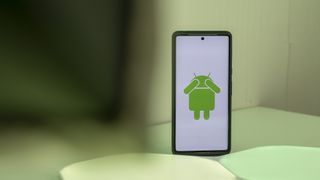 Android logo covering its eyes