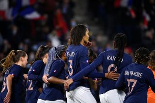 Women's Euro 2022: France's defender Wendie Renard (C) celebrates with teammates after scoring her team's first goal during the Tournoi de France women's friendly final football match between France and The Netherlands at the Oceane Stadium in Le Havre, northern France, on February 22, 2022.