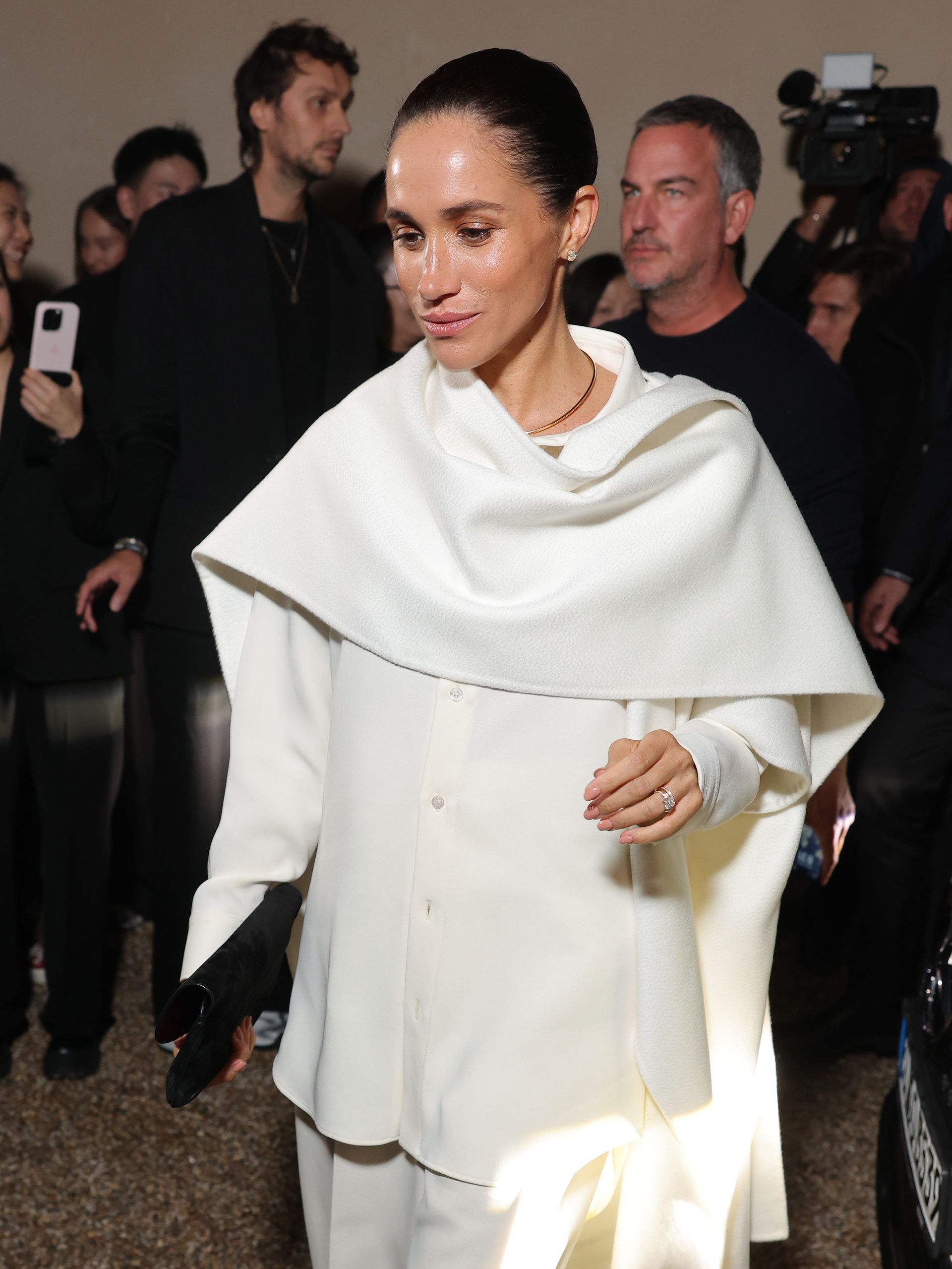 Meghan Markle wearing Balenciaga at the runway show in Paris