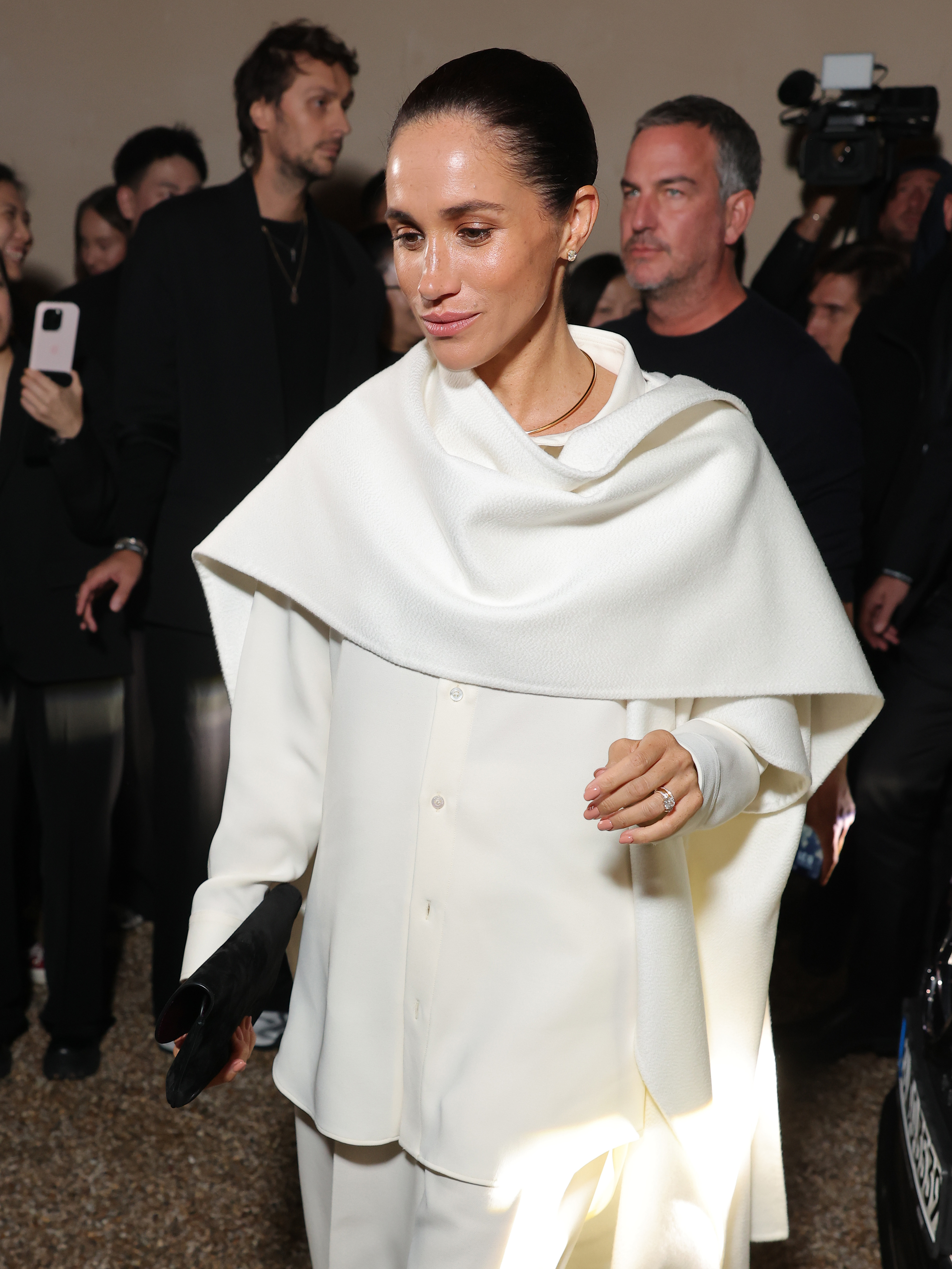 Meghan Markle wearing Balenciaga at the runway show in Paris