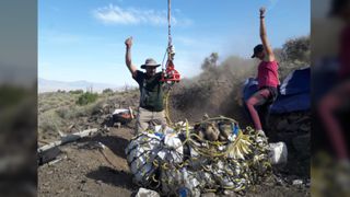 The remoteness and ruggedness of the Augusta Mountains in combination with the large size of the fossils we are excavating requires helicopter support.