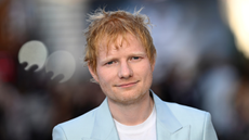 ed sheeran on a plain background