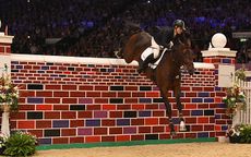 Holly Smith riding QUALITY OLD JOKER, winner of The Thistledown Puissance during HOYS in the NEC in Warwickshire in the UK on 8th October 2016