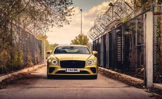 Bentley Continental GT Speed Convertible in gold front view