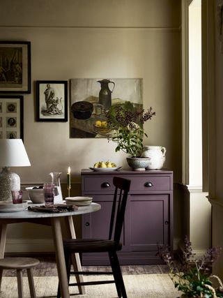 purple painted sideboard in dining room by Neptune