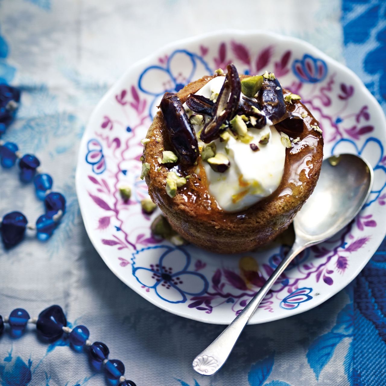 Fluffy egg free pistachio cakes with orange syrup and dates recipe