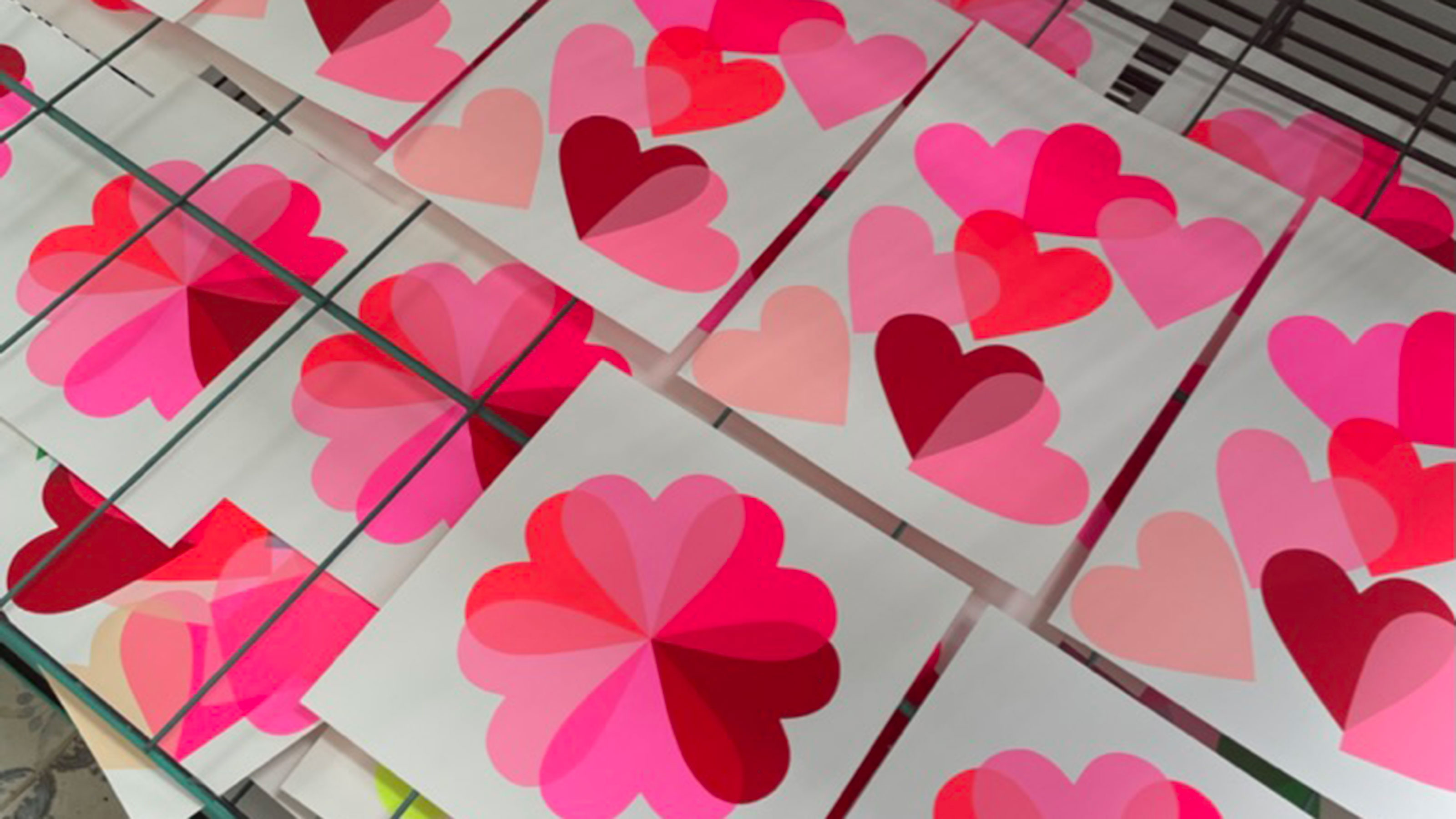 Rows of screen printed pink hearts