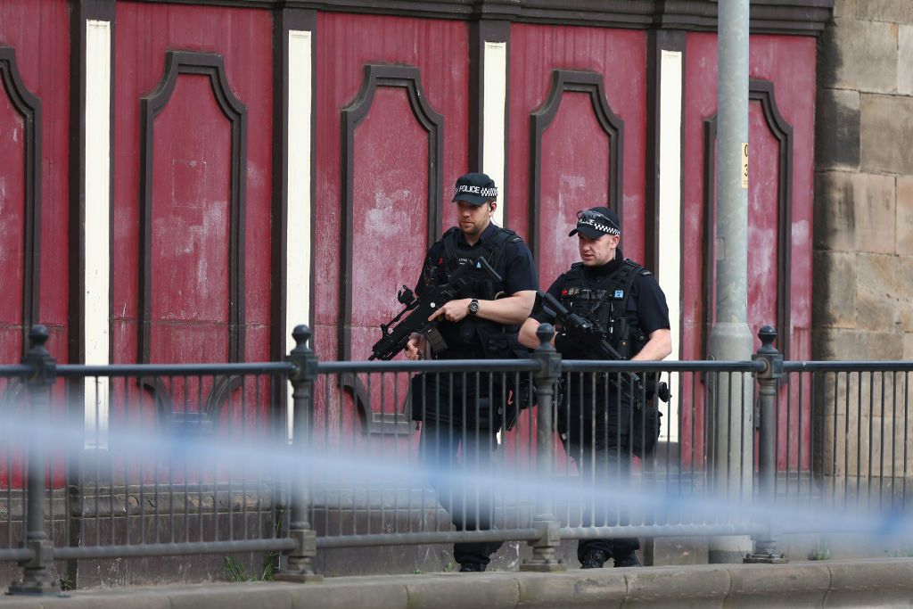 Armed police patrol Manchester.