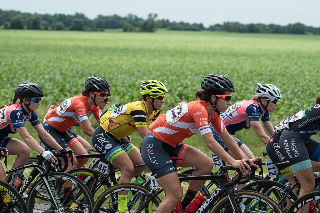 Yellow Jersey Brianna Walle (Team TIBCO-SVB) amongst Rally Cycling riders Catherine Ouellette and Sara Poidevin.