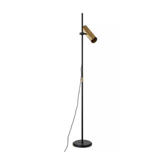 A tall black steel floor lamp with a gold cylinder lampshade