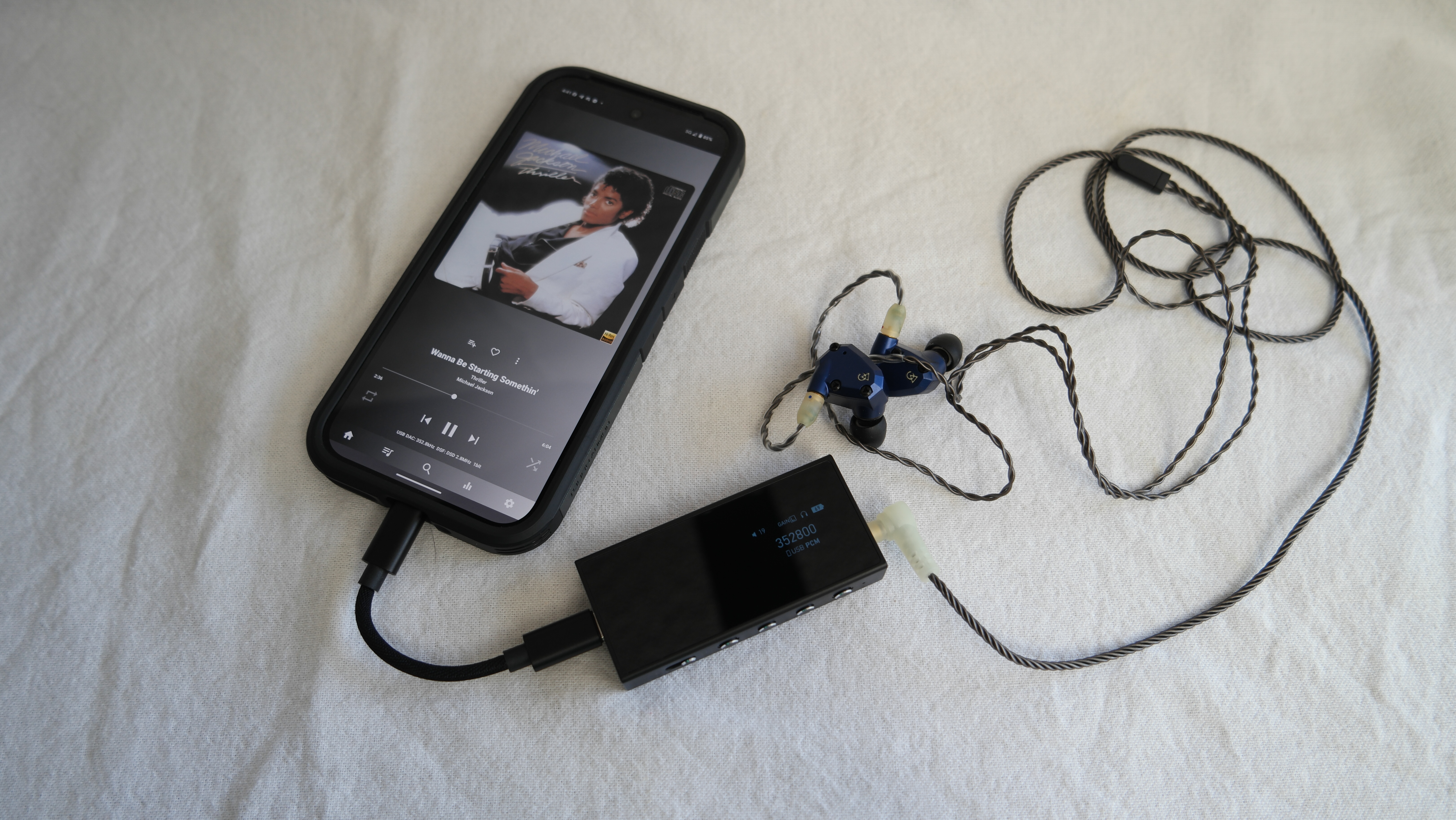 Questyle M18i showing Michael Jackson PCM file playing thru Campfire Audio IEMs