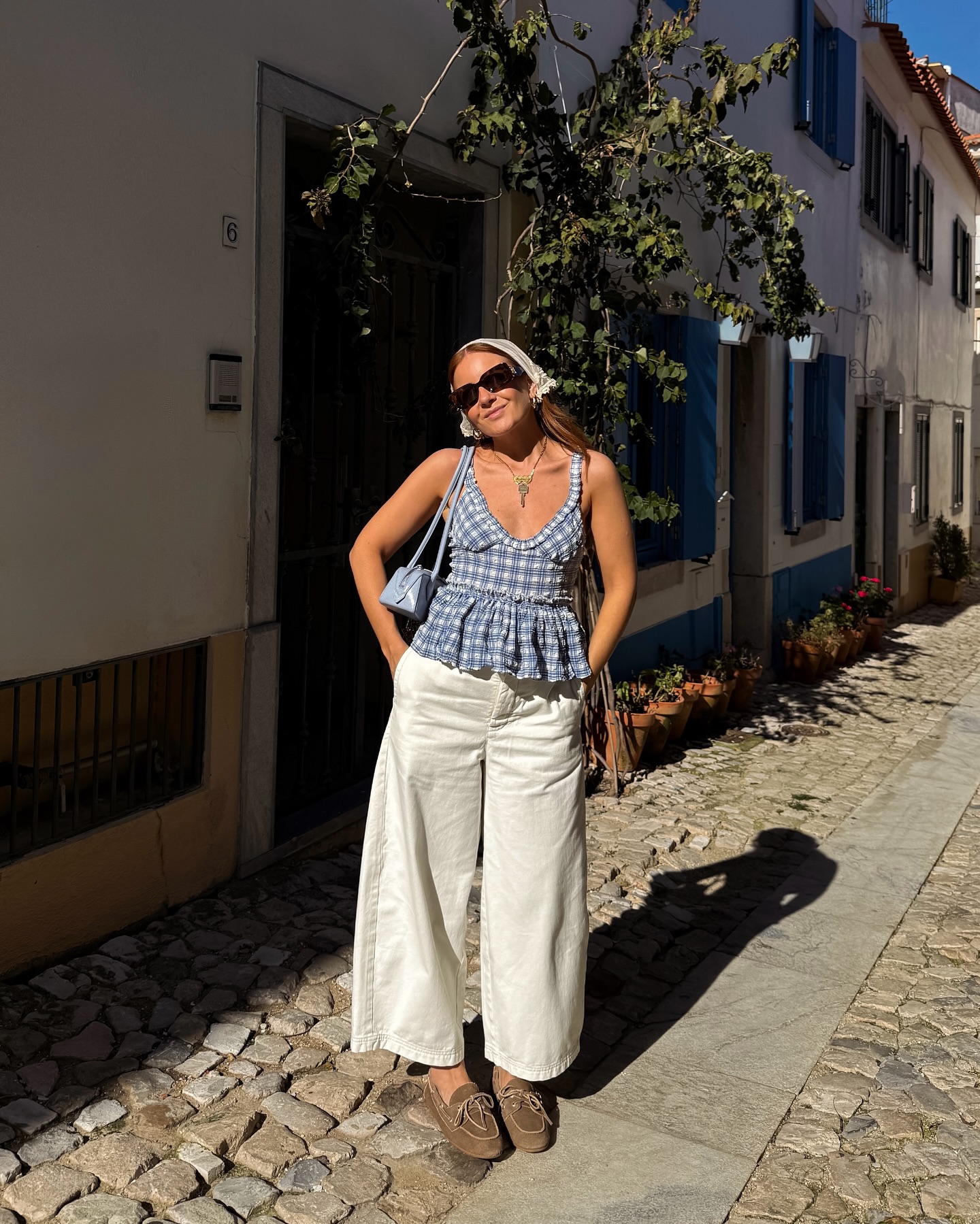 An image of @rebeccaferrazwyatt wearing one of the best gingham tops.