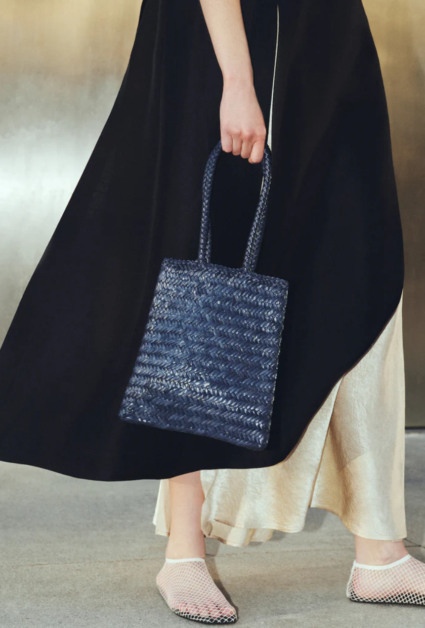 An image of a woven leather bag, one of the biggest summer accessory trends, from Liffner