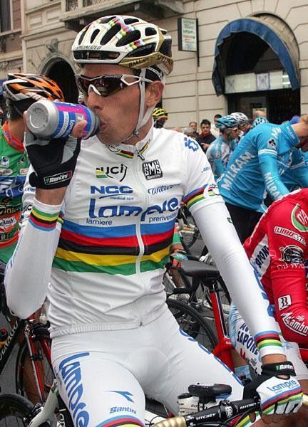 Ballan takes a drink to get hydrated before take-off.