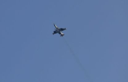 A Russian fighter plane flies in Syria