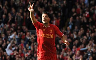 Striker Luis Suarez playing for Liverpool, celebrating after scoring a goal