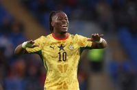 Brandon Thomas-Asante of Ghana smiling with his arms raised vs Wales. (Photo by Catherine Ivill - AMA/Getty Images)
