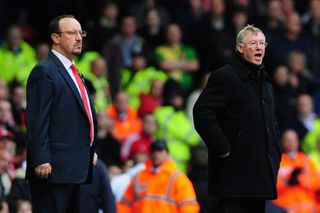 Liverpool manager Rafa Benitez and Manchester United boss Sir Alex Ferguson during a match at Anfield in October 2009.