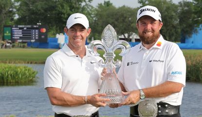 Rory McIlroy and Shane Lowry hold the Zurich Classic of New Orleans trophy