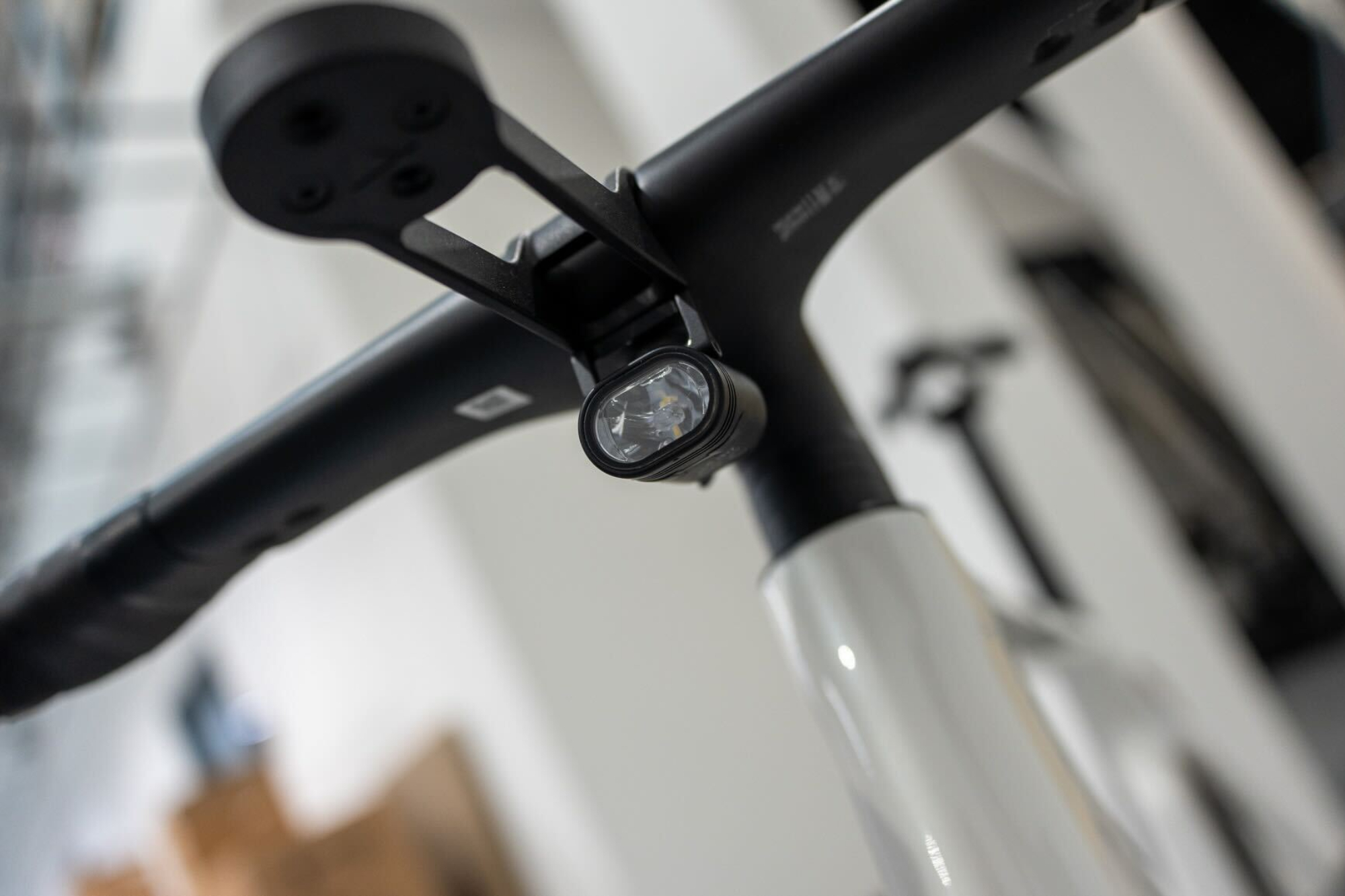 Detail of the integrated front light on the Canyon Endurace:ONfly e-bike