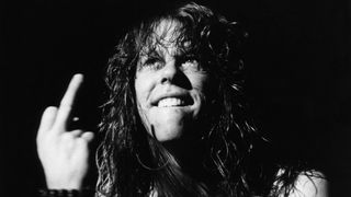 Metallica’s James Hetfield giving the audience the middle finger