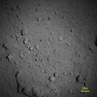 Using its Optical Navigation Camera – Telescopic, the Hayabusa2 spacecraft captured this view of the asteroid Ryugu from about 1 kilometer (0.6 miles) away on Aug. 7, 2018.