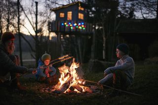 garden activities for kids: toasting marshmallows on fire